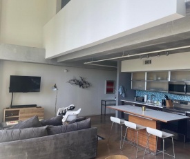 Artsy Chic 1BR Condo 30day min with WiFi AC Parking TV Furnished Rooftop