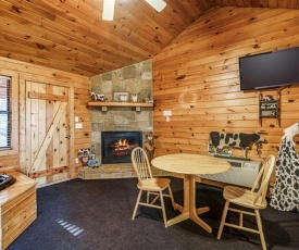 Country Getaway Hot Tub Heart Shaped Jetted Jacuzzi Stone Gas Log Fireplace Rocking Chairs