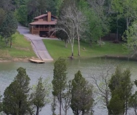 Free Xplorie Attractions Every Day! - Driftwood Log Cabin