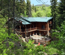 Log Cabin On The Stream
